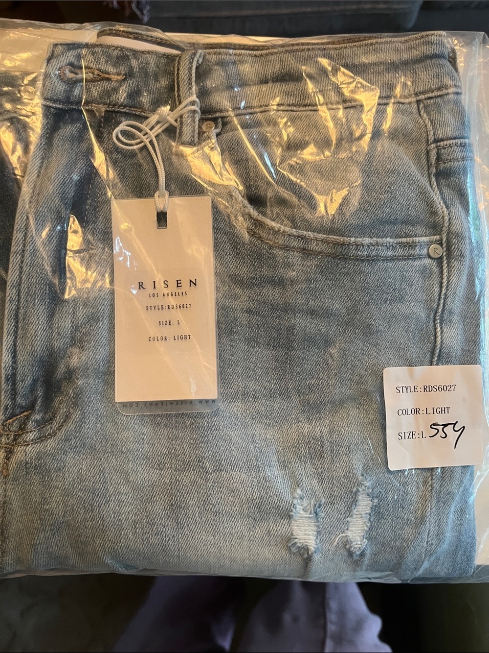 Risen Jean Distressed Light Wash Denim Shorts - Women's - Picture 6 of 6